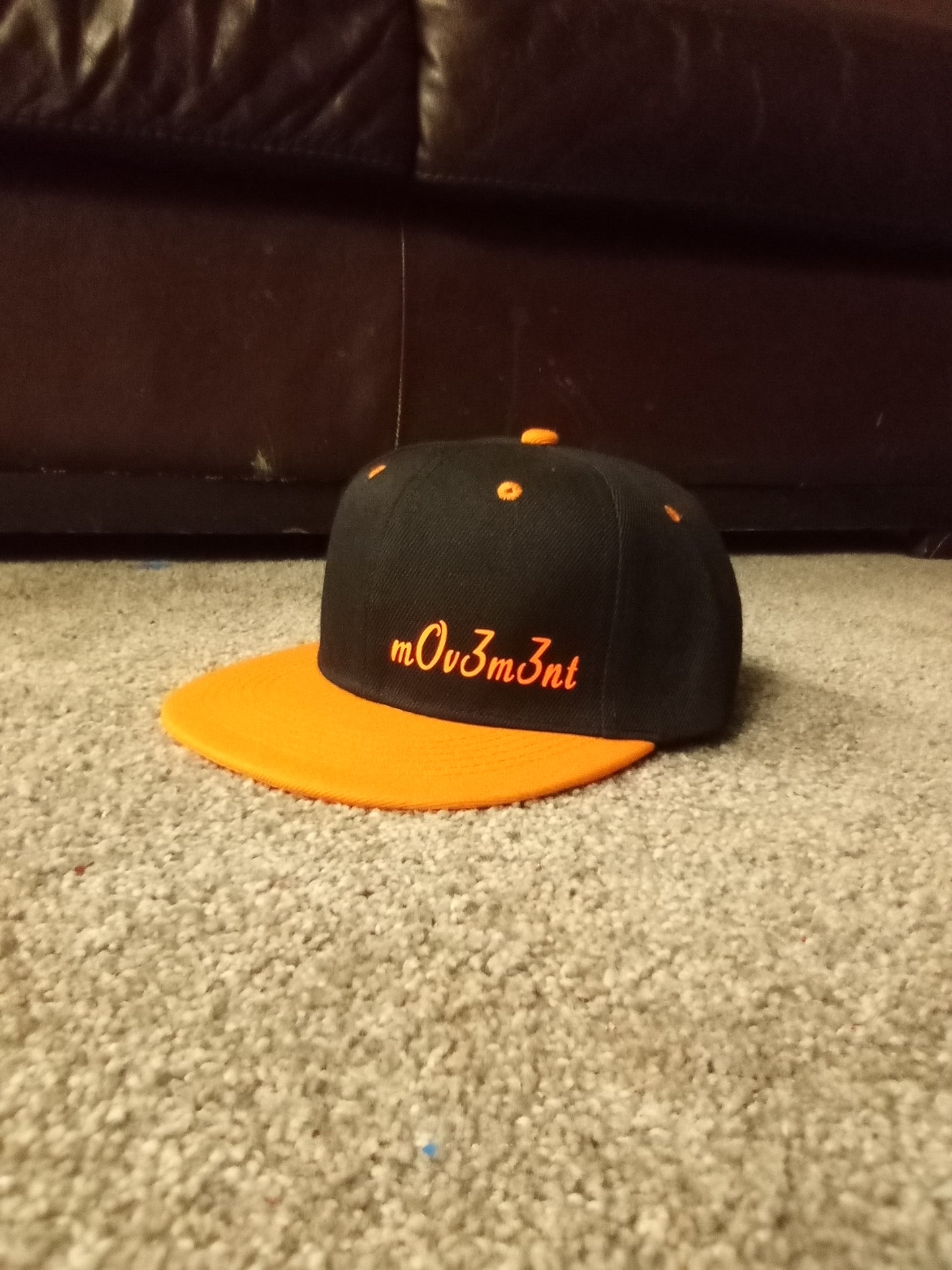 Black and orange snapback