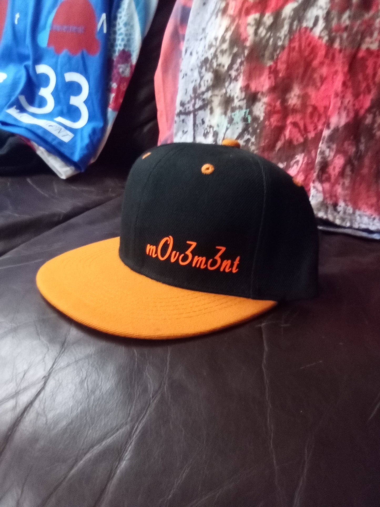 Black and orange snapback