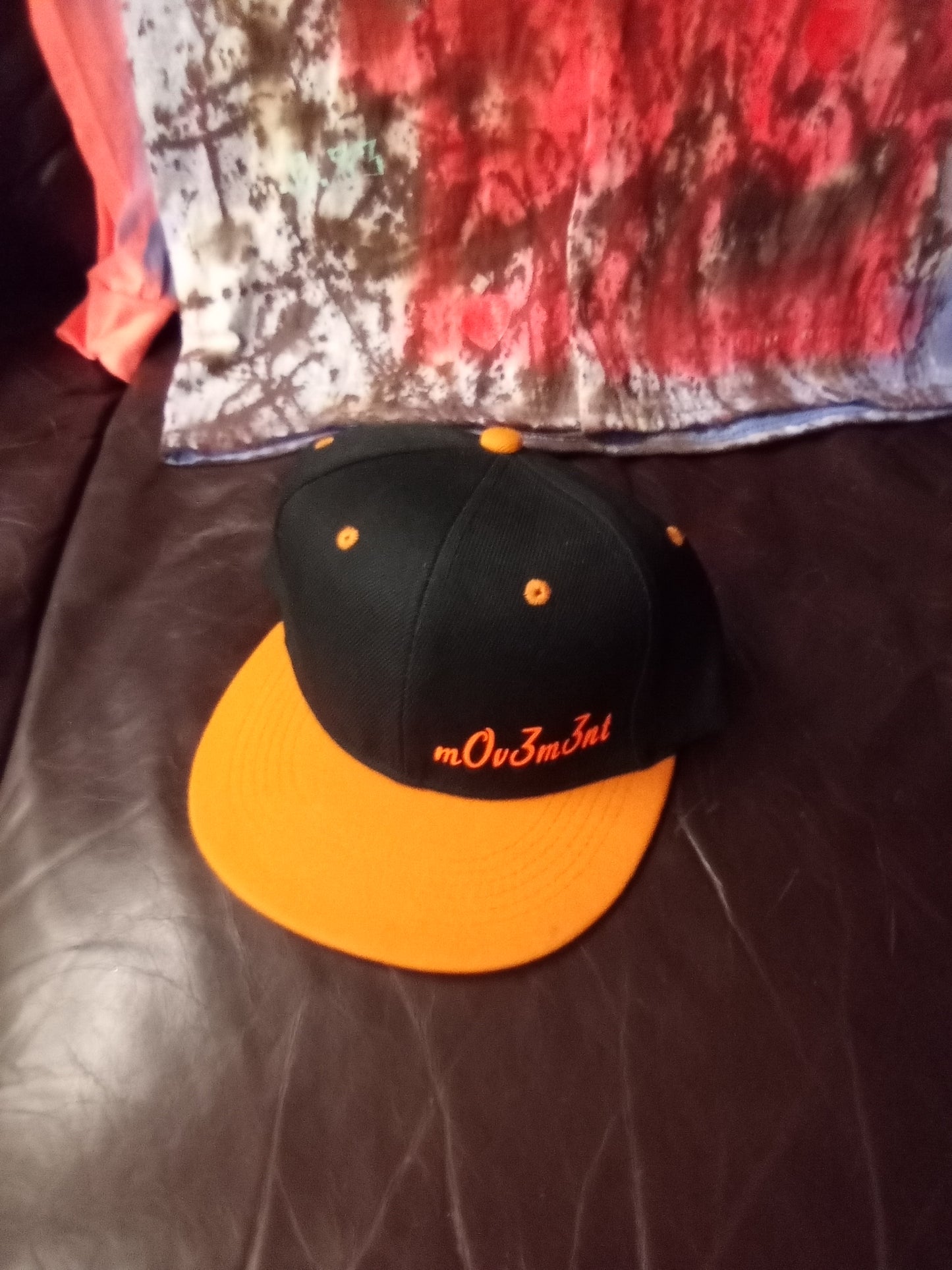 Black and orange snapback